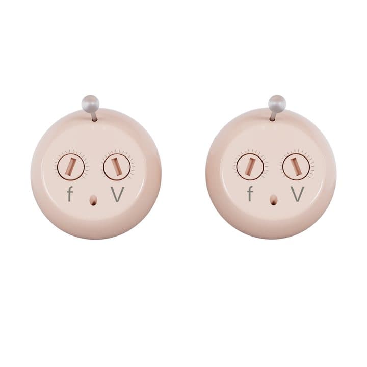 Closed white Audien Hearing charging case with two Atom One hearing aids resting on top