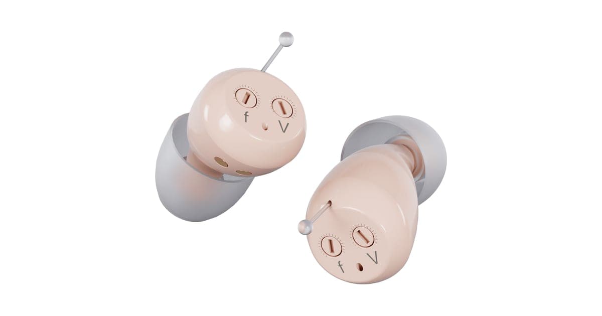 Audien Atom One hearing aids in an open white charging case with one aid lifted out