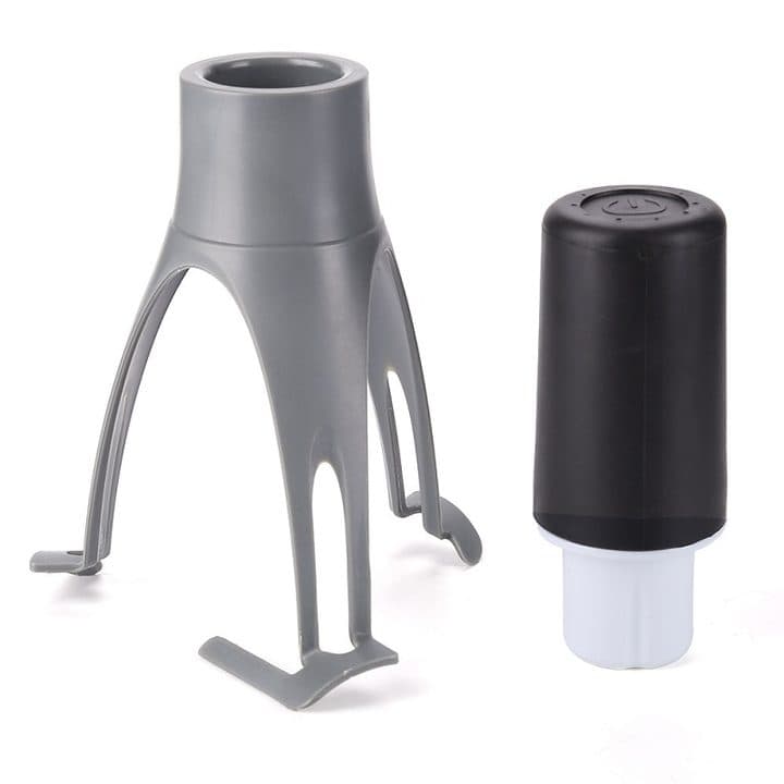 Grey AutoMix leg assembly with four curved feet beside the black cylindrical motor unit, separated