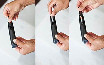 Three photos of hands opening a black bite pen and inserting an AA battery, used for the long operation add-on