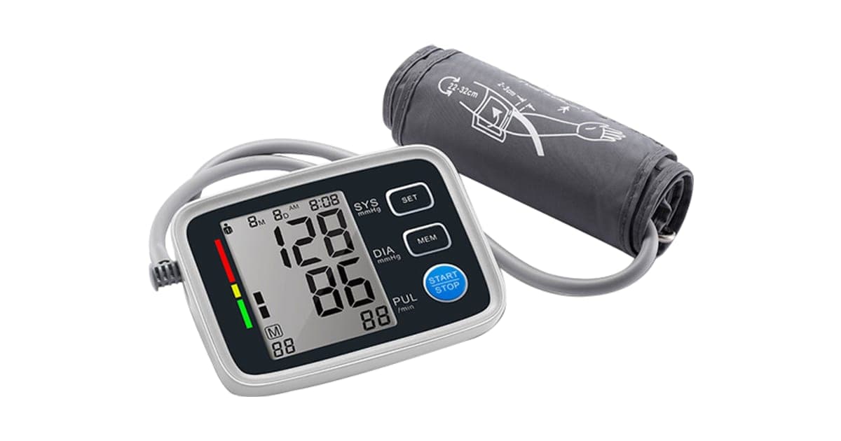 BloodPressureX white and black blood pressure monitor showing a reading of 128 over 86 with a grey upper-arm cuff