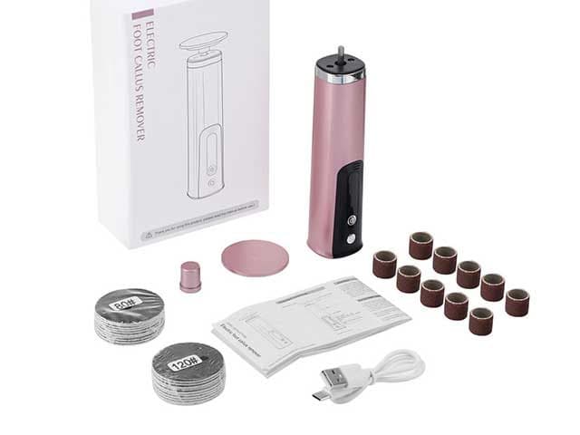 CallusClear Pro box, rose-gold body, disc head, stacks of 80 and 120 grit sanding discs, sanding rings, manual and USB-C cable