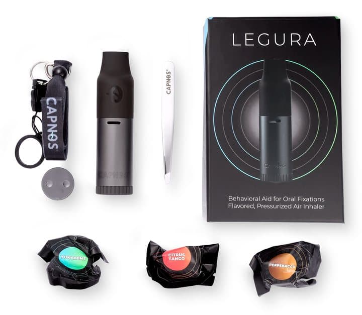 Capnos Legura box contents: device, lanyard, tweezers, three flavour packs and the Legura box