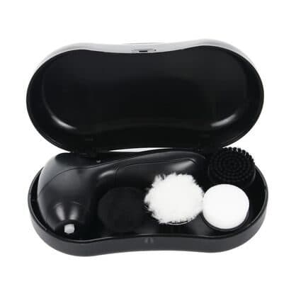 Open black plastic case holding the CleanX brush body and four heads: a black pad, a fluffy white buffer, a white sponge and a black bristle brush