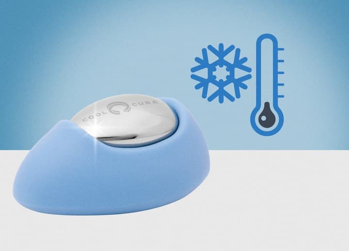 CoolCura pod sitting in its light blue foam holder with a snowflake and thermometer icon
