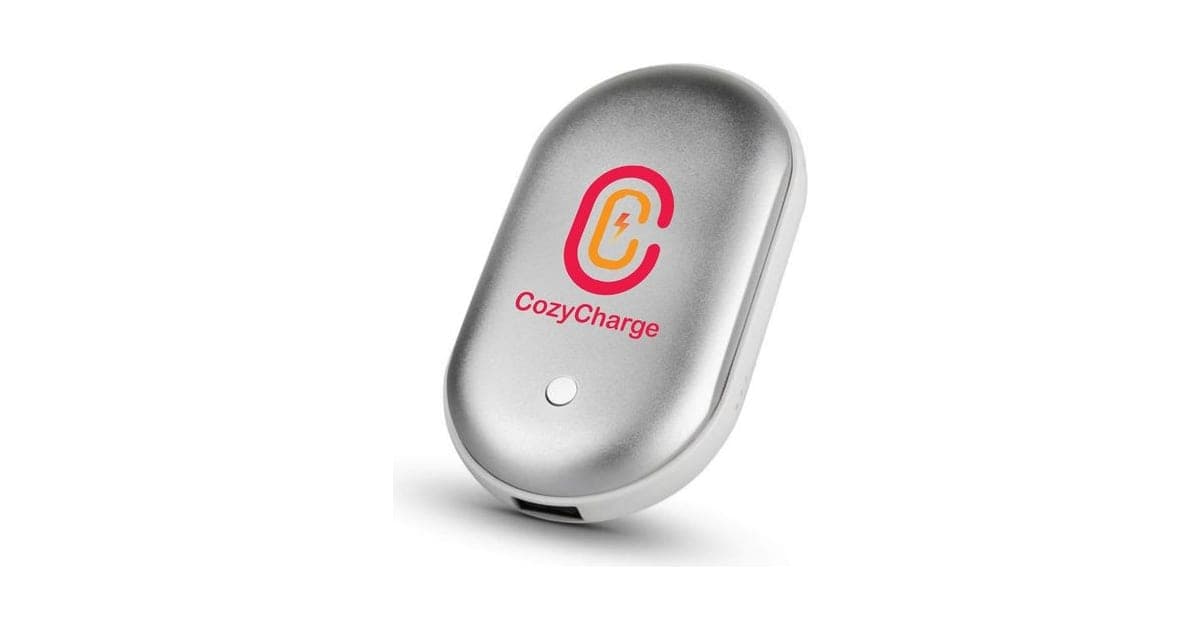 Silver CozyCharge rechargeable hand warmer with a red C logo and a single button
