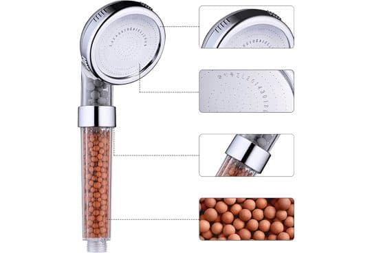 Chrome IOnic Spa Shower handheld head with a clear handle full of orange mineral beads, with close-ups of the spray face and beads