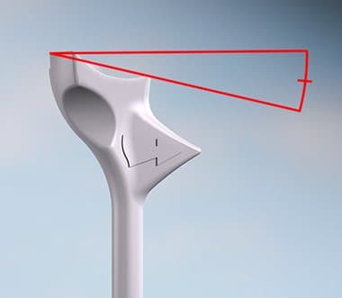 Close-up of the FlightPath tee head with a red line showing its angled launch platform