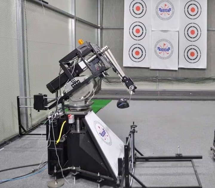 Golf swing robot in an indoor testing bay used in FlightPath's own testing