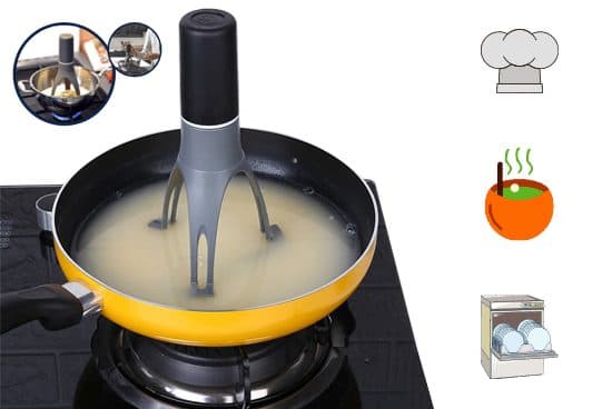 Black and grey AutoMix stirrer with spinning legs standing in a yellow frying pan of liquid on a gas hob