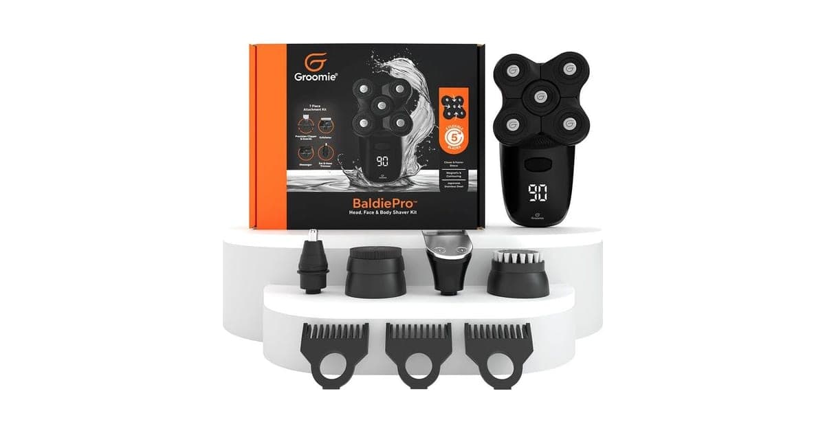 Groomie BaldiePro head shaver kit with box, shaver, clipper guards and attachments on display stands