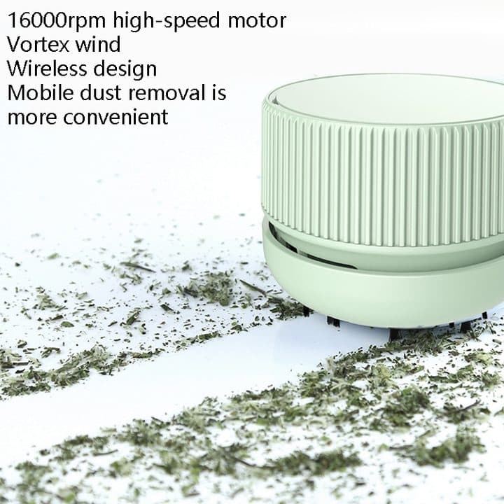 Mint green HandyVacuum clearing a strip through scattered dried herbs, with text claiming a 16000 rpm high-speed motor