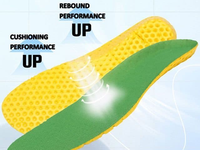 Yellow and green honeycomb insole labelled cushioning performance up and rebound performance up