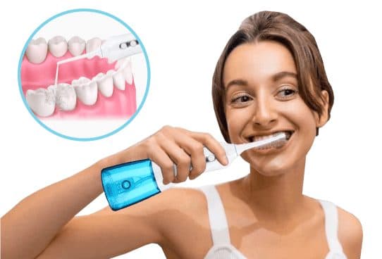 Woman holding a JetFloss Pro with a blue water tank, with a circular inset of a jet of water cleaning between lower teeth