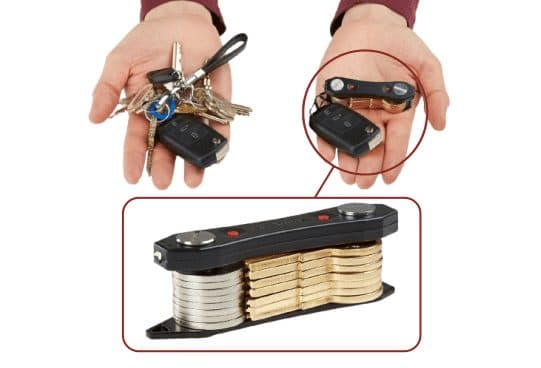 A loose bunch of keys in one hand, the same keys stacked in a black KeyMaster bar in the other, and a close-up of brass and silver keys between two plates
