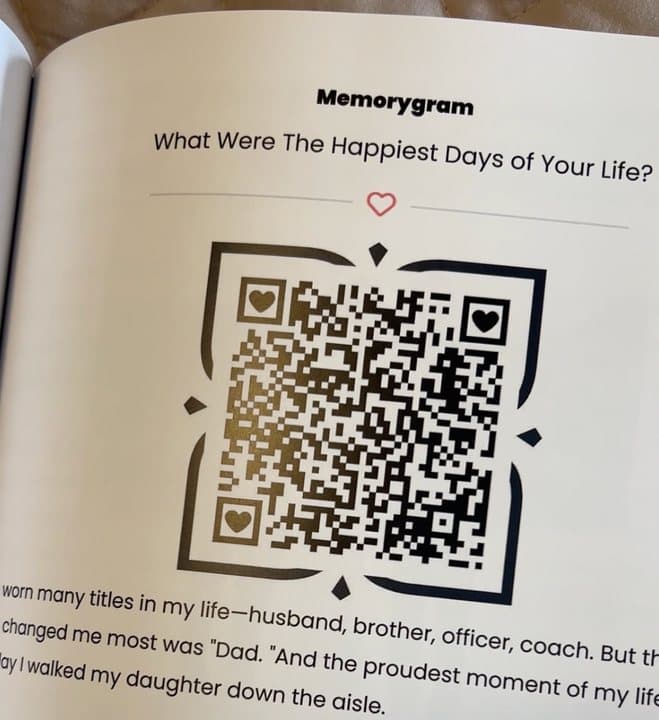 Memorygram book page with a large QR code under a question about the happiest days of life