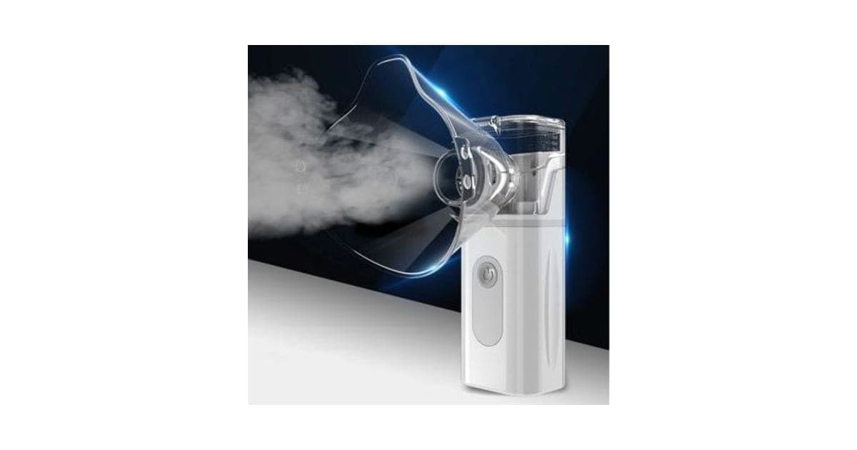 White handheld MyNebulizer with a clear face mask attached, releasing a cloud of mist, against a dark blue background