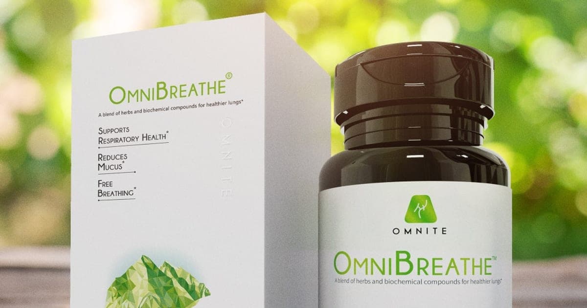 OmniBreathe supplement bottle and box on a wooden table outdoors