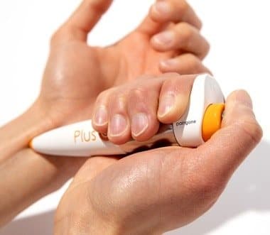 Paingone Plus pen pressed against the inside of a wrist