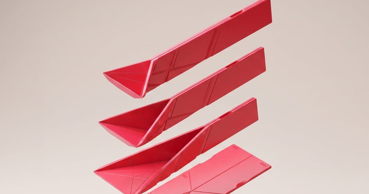 Red Polygons folding measuring spoons folded into three different sizes, floating against a beige background