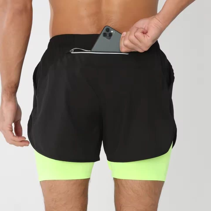 Back view of RUNNR shorts with a phone in the rear pocket