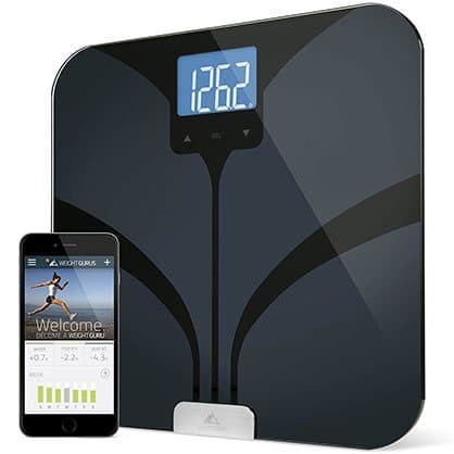 Black glass bathroom scale showing a weight reading next to a phone app, sold as the Smart Connected Scale add-on