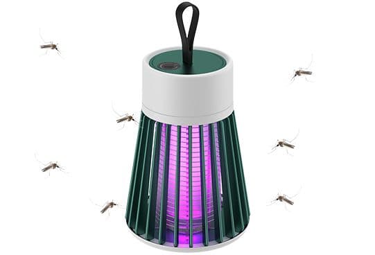 Smosquito lantern with a green slatted cage around a purple light, a white top and a black strap, with mosquitoes around it