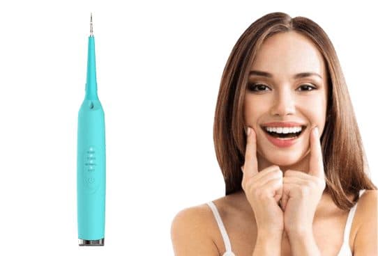 Slim turquoise TeethShine Pro with a curved metal scaler tip and a column of mode lights, next to a woman smiling widely