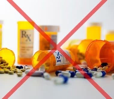 Bottles of prescription pills crossed out with a red X, from the TheraICE page