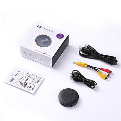 Box labelled Q1 WiFi display dongle with HD and AV output, beside the black round dongle, an HDMI extension, a USB cable, a red white and yellow AV cable and an instruction leaflet