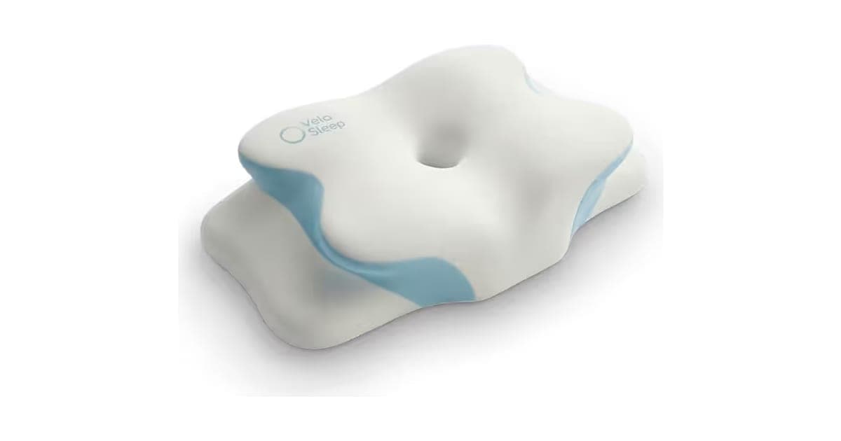 White butterfly-shaped VelaSleep memory foam pillow with blue side panels and a centre head hollow