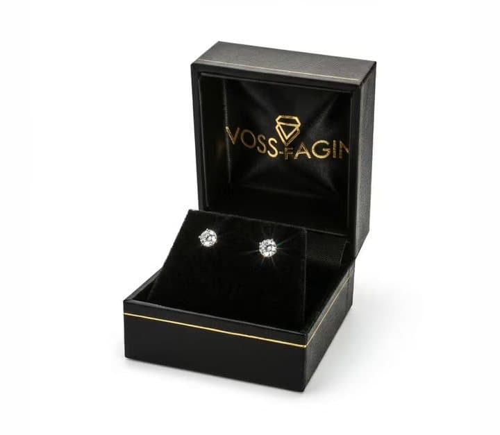 Voss+Agin diamond stud earrings in an open black gift box with the brand logo
