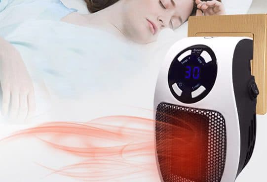 WarmAIR plug-in heater with a black control ring, digital display, mesh grille glowing red and warm air graphics beside a sleeping woman