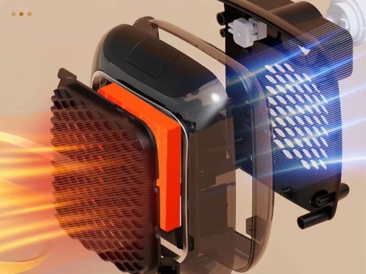 Exploded render of a wall heater showing an orange heating element, grille, casing and rear fan with airflow lines