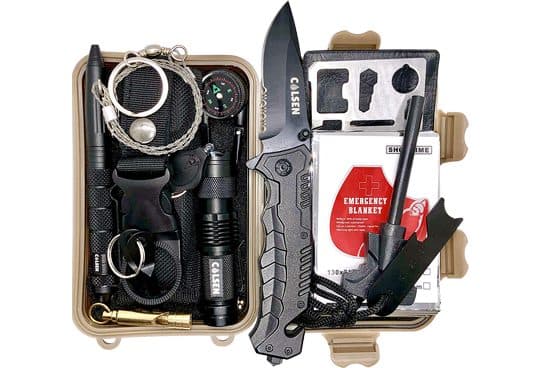 Tan plastic case holding a black folding knife marked Calsen, a ferro rod fire starter, a small torch, a compass, a coiled wire saw, a tactical pen, a card multi-tool, an emergency blanket and carabiners