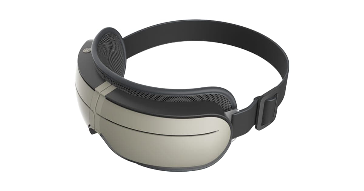 ZenMind XP grey and silver goggle-style eye massager with a padded black rim and an adjustable strap