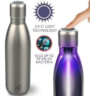 Silver bottle with a UV-C light technology badge and a 99.9 percent of bacteria claim, and a finger pressing a cap that lights the bottle purple