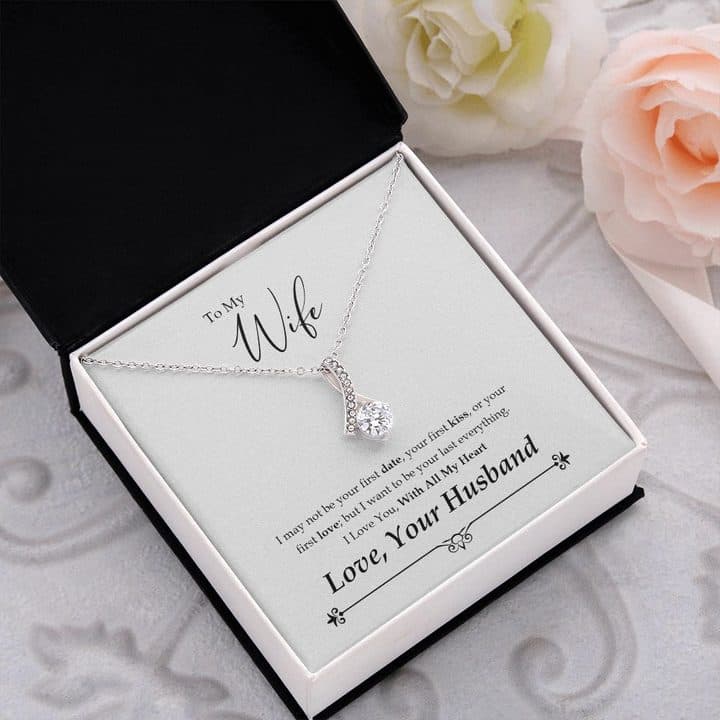 Alluring Beauty Necklace in a black-and-white gift box on a card reading To My Wife, I may not be your first date, your first kiss, or your first love