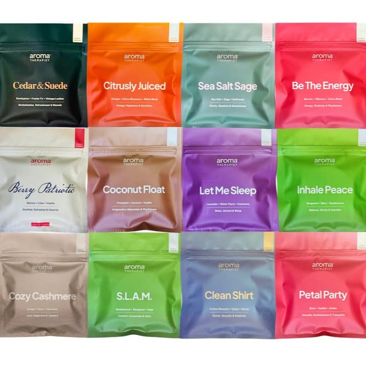 Twelve colourful AromaPuck pouches including Citrusly Juiced, Let Me Sleep and Cozy Cashmere