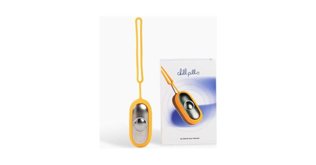Orange Chill Pill handheld device with a silver contact and wrist strap beside its white box
