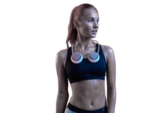 Athletic woman in a black sports top wearing a white CoolFeel Max neck fan with round fan pods at the front