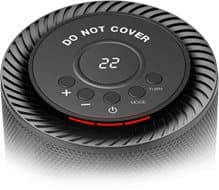 Top of the EcoHeat S heater with a digital display reading 22, plus, minus, power, mode and turn buttons and a Do Not Cover warning