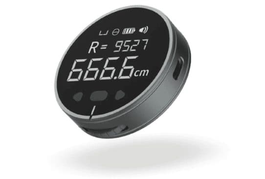 Puck-shaped ElectronX Ruler with a glossy black display reading 666.6 cm and a radius value, three buttons and a pointer mark