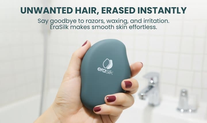 Hand holding the Erasilk crystal hair eraser in a bathroom to show its palm size