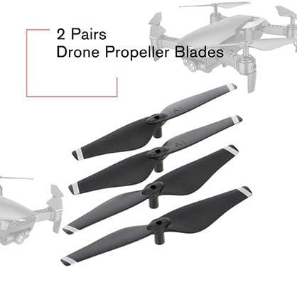 Two pairs of black drone propeller blades with white tips, beside faded images of a foldable drone, under the words 2 pairs drone propeller blades