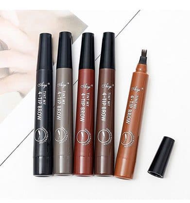 Five Aiyi Tint My 4-Tip Brow pens in black, grey, auburn, brown and tan, one uncapped to show the forked tip
