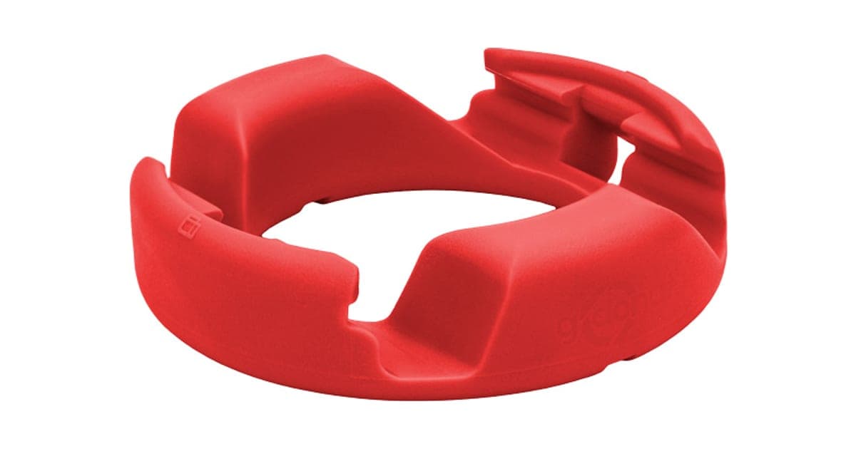 Red GoDonut Plus+ ring-shaped phone and tablet stand with two grooves on a white background