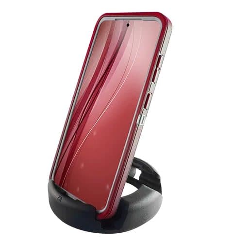 Phone in a red case standing upright in a black GoDonut stand