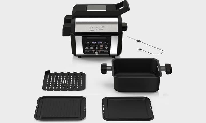 Gourmax Pro base with its pot, grill and griddle plates and temperature probe laid out