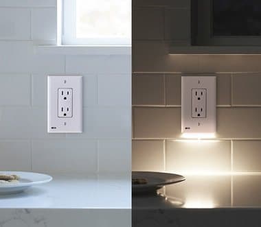 Kitchen outlet with GuideLight shown off in daylight and glowing at night
